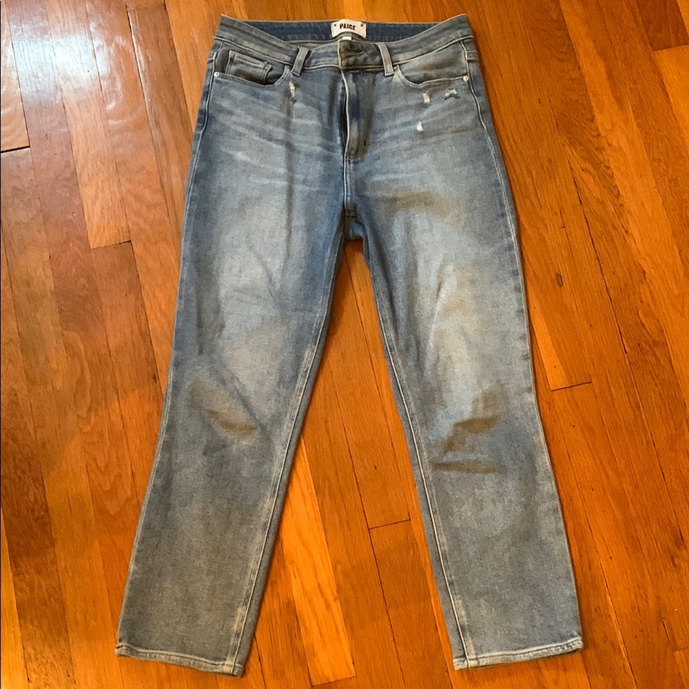 PAIGE Blue Skinny Jeans with some distressing.